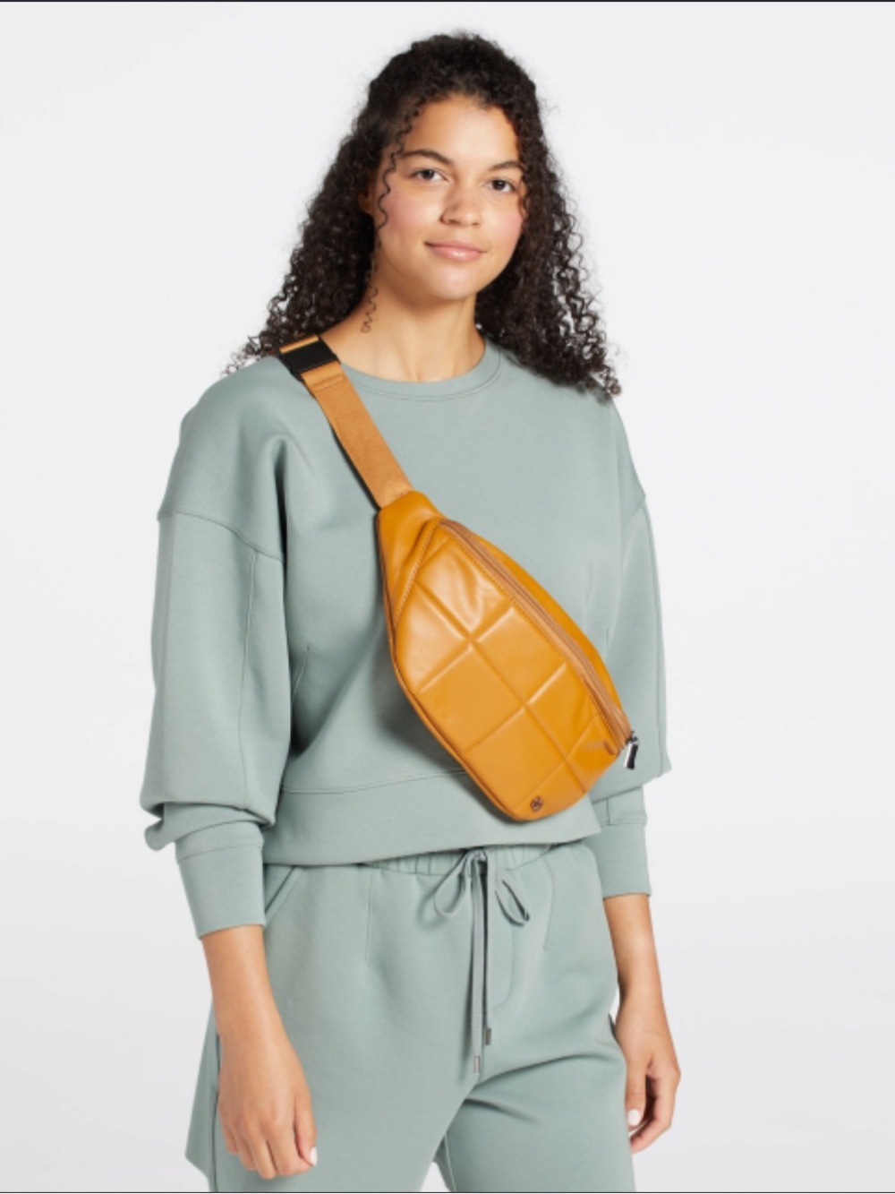 CALIA by Carrie Underwood Quilted Tan Crossbody Belt Bag